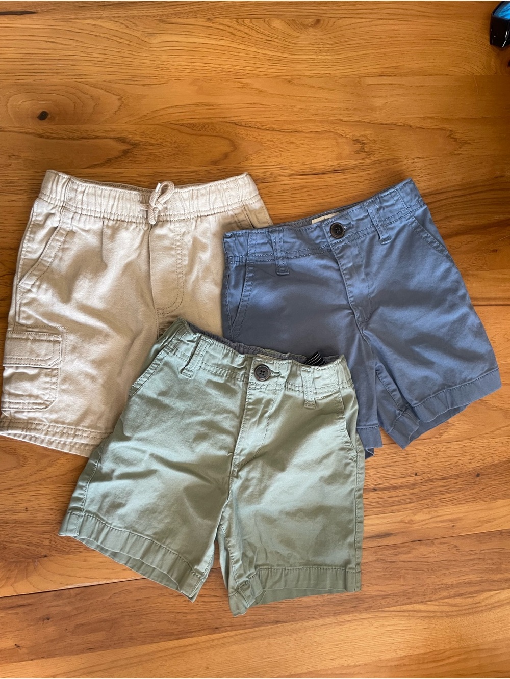 OshKosh B'gosh Three-Pack Cotton Shorts in Cream, Blue, and Green